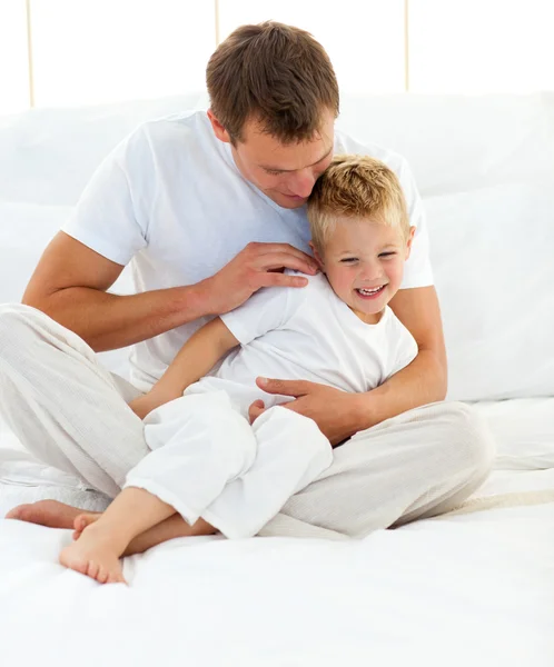 Lively dad and his son playing together — Stock Photo, Image