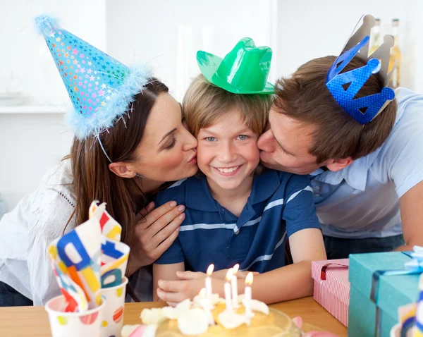 Close-up of parents celebrating their son's birthday — Stock Photo, Image