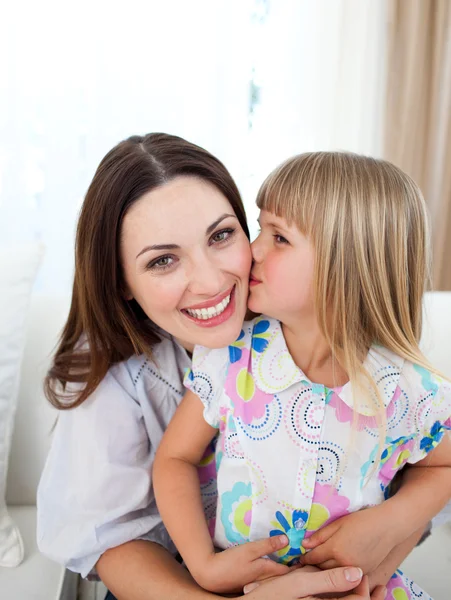 Cute girl kissing her mother — Stock Photo, Image