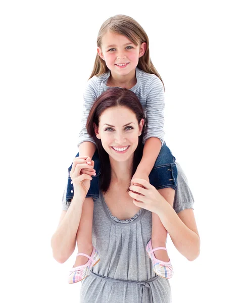 Young mother giving her daughter piggyback ride — Stock Photo, Image