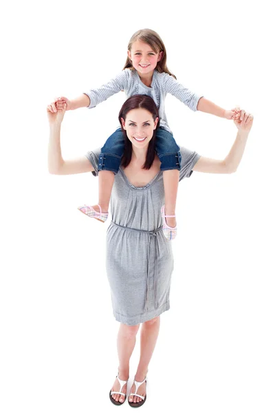Attractive mother giving her daughter piggyback ride — Stock Photo, Image