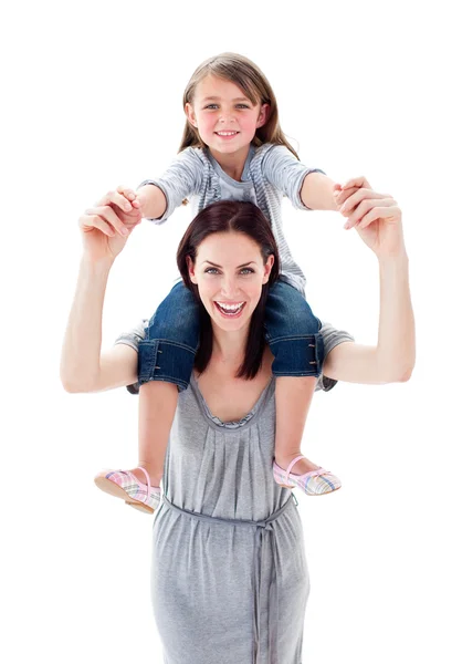 Pretty mother giving her daughter piggyback ride — Stock Photo, Image