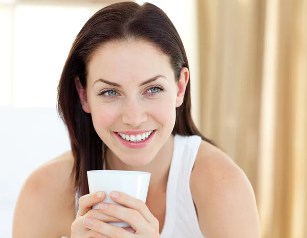 Cute woman drinking a coffee — Stock Photo, Image