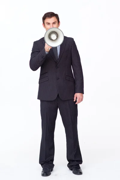 Aantrekkelijke zakenman schreeuwen via een megafoon — Stockfoto