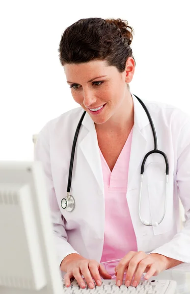 Female doctor working at a computer — Stock Photo, Image