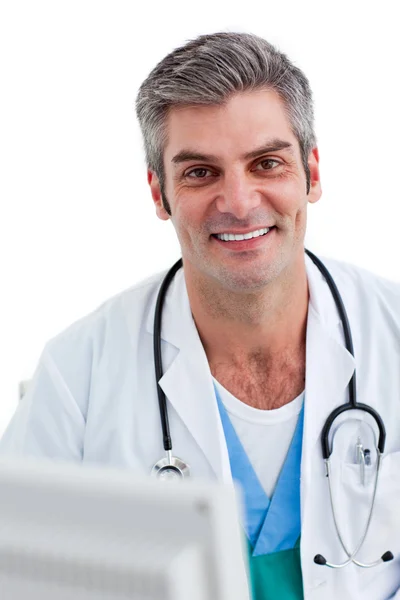 Portrait of a male doctor holding a stethoscope — Stock Photo, Image