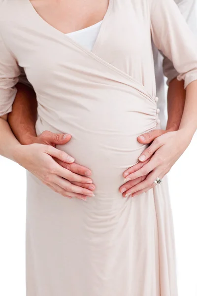 Nahaufnahme einer schwangeren Frau mit ihrem Mann — Stockfoto