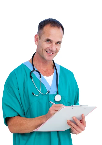 Retrato de un carismático médico masculino escribiendo notas — Foto de Stock