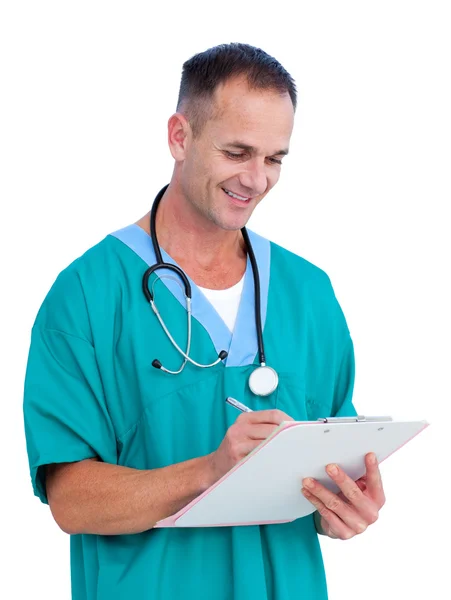 Porträt eines hübschen männlichen Arztes, der Notizen schreibt — Stockfoto