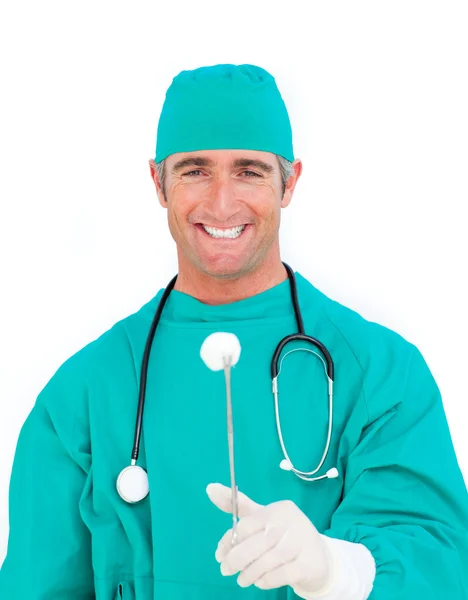 Successful surgeon holding surgical forceps — Stock Photo, Image