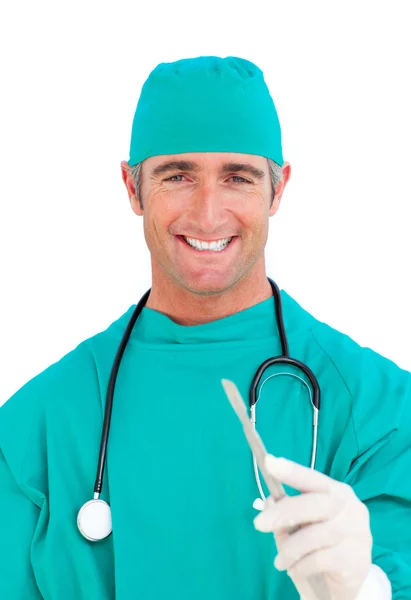 Charming surgeon holding a scalpel — Stock Photo, Image