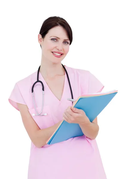 Retrato de una bonita enfermera sosteniendo un estetoscopio —  Fotos de Stock