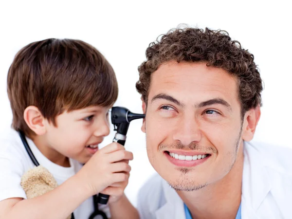 Adorable little boy playing with the doctor — Stock Photo, Image