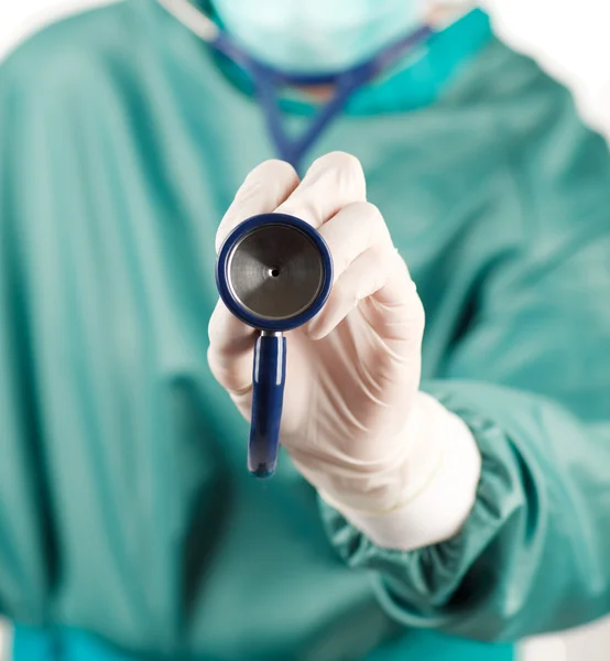 Close-up of a stethoscope hold by a surgeon — Stock Photo, Image