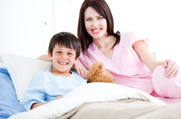 Smiling little boy with his nurse — Stock Photo, Image