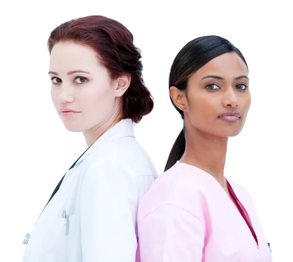 Porträtt av karismatiska sjuksköterska och läkare står — Stockfoto