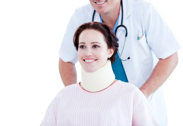 Portrait of a smiling woman with a neck brace sitting on a wheel — Stock Photo, Image