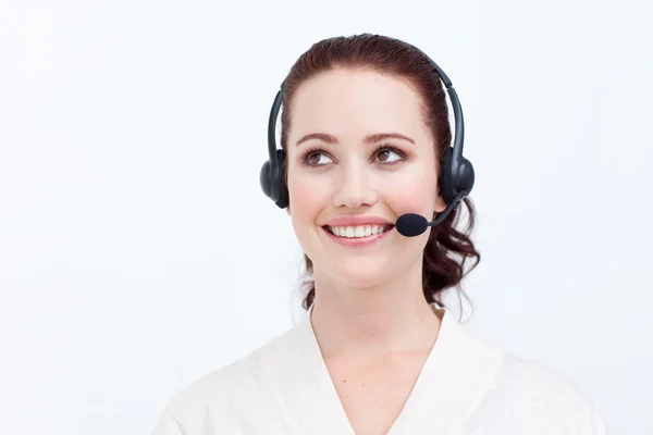 Mooie zakenvrouw met een headset op zoek naar boven — Stockfoto