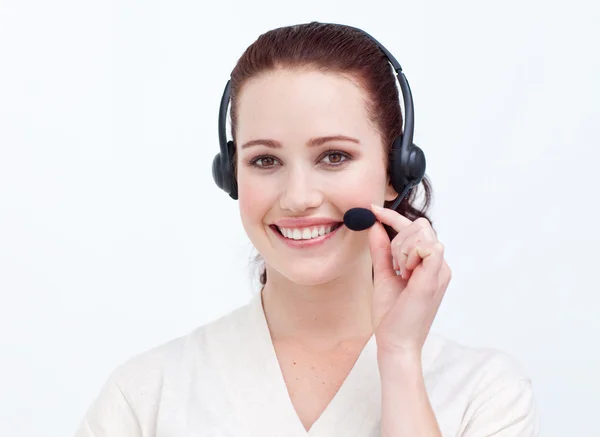Attraktiva affärskvinna med ett headset på — Stockfoto