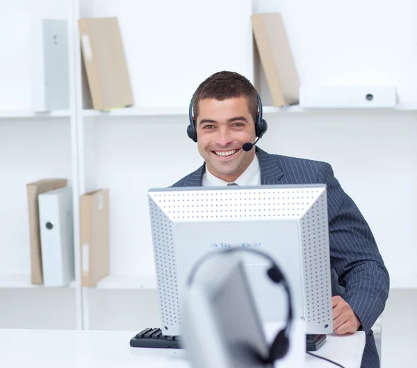 Businessman working in a call center — Stock Photo, Image
