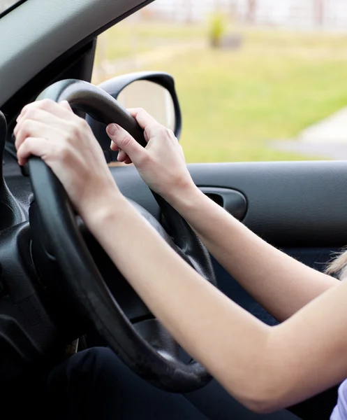 Close-up of a woman at the wheel — Stock Photo, Image