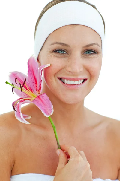 Delighted woman holding a flower — Stock Photo, Image