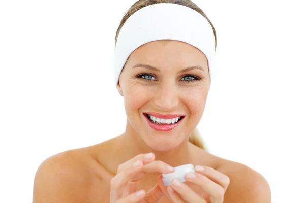 Delighted woman applying lip balm — Stock Photo, Image