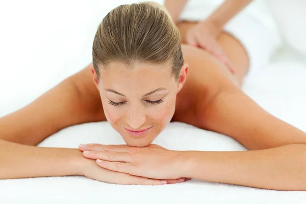 Satisfied woman enjoying a massage — Stock Photo, Image