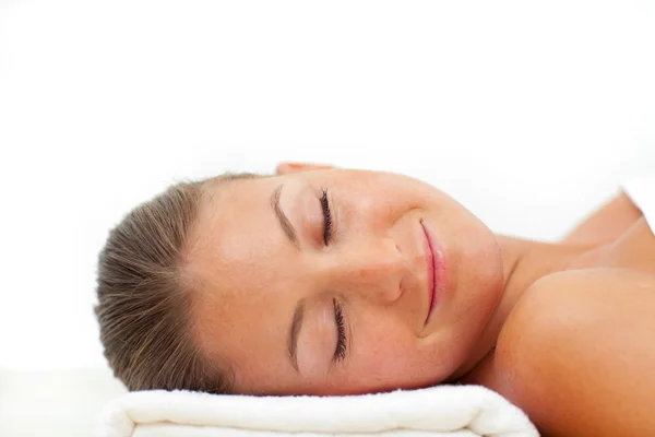 Portrait of smiling woman relaxing after a spa treatment — Stock Photo, Image