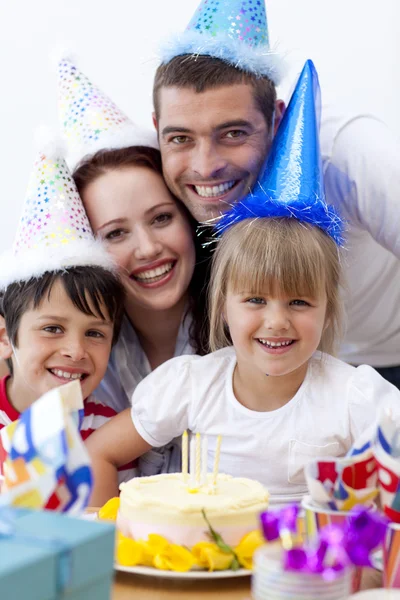 Portrait of happy family celebrating a birthday — Stock Photo, Image