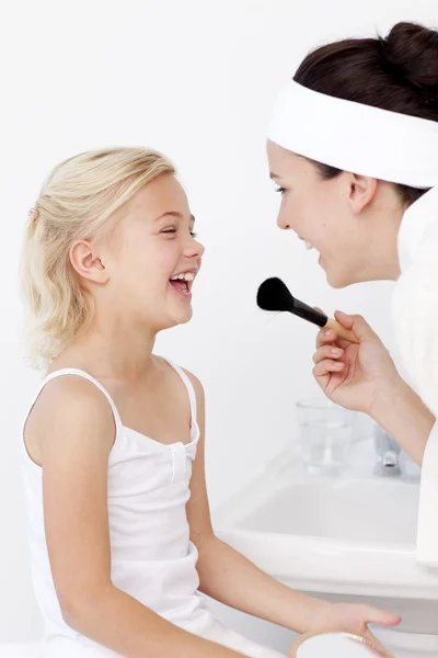 Daughter and mother playing with makeup — Stock Photo, Image