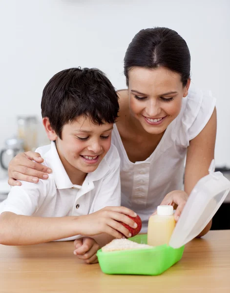 Mother and son making the school lunch — Stock Photo, Image