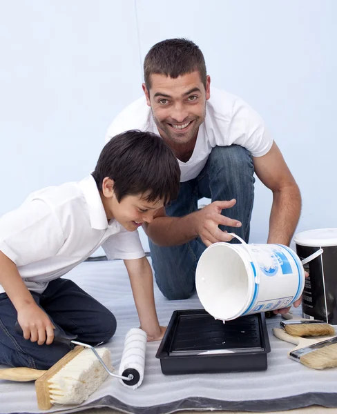 Father and son painting a bedroom — Stock Photo, Image