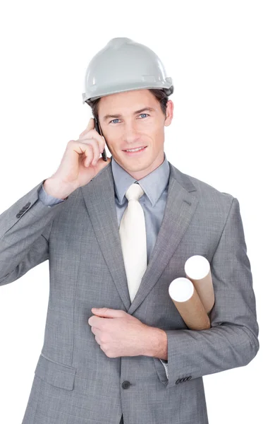 Charming male architect on phone Royalty Free Stock Images