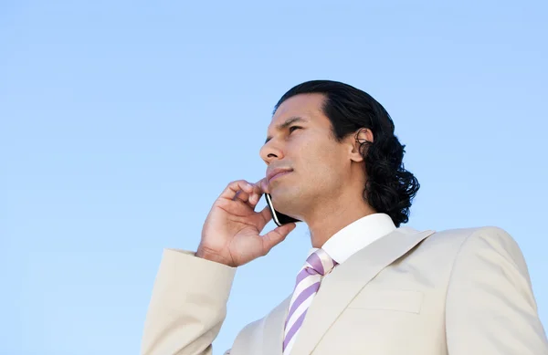 Portrait of an handsome business man using a cellphone — Stock Photo, Image