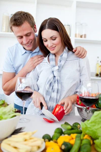 Loving couple preparing dinner Stock Image