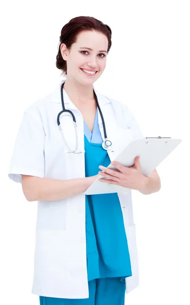 Positive female doctor making notes in a patient's folder Stock Photo