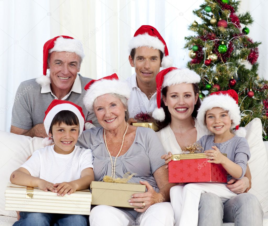 Happy family at Christmas time — Stock Photo © Wavebreakmedia #10298206