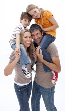 Mother and father giving children piggyback ride clipart