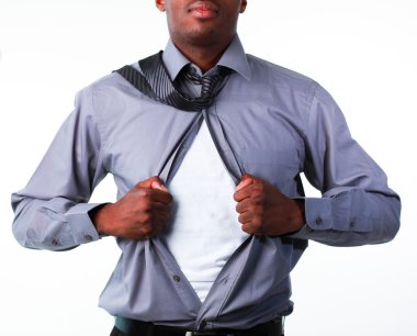 Businessman showing tshirt under his suit clipart