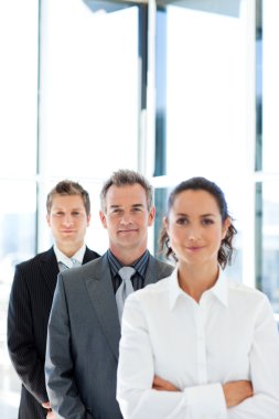 Matureusinessman in a line with his business team clipart