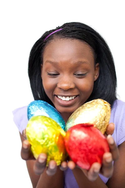stock image Cheerful woman holding colorful Easter eggs