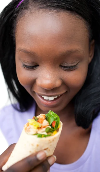 stock image Delighted woman eating a wrap