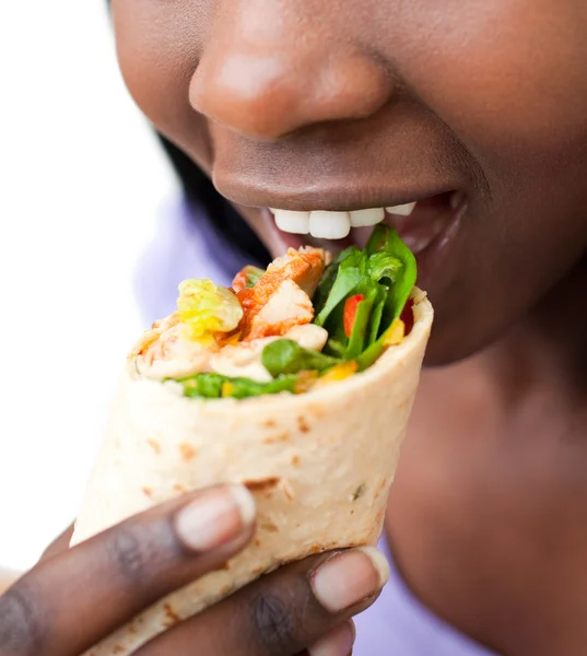 Stock image Close-up of a woman eating a wrap