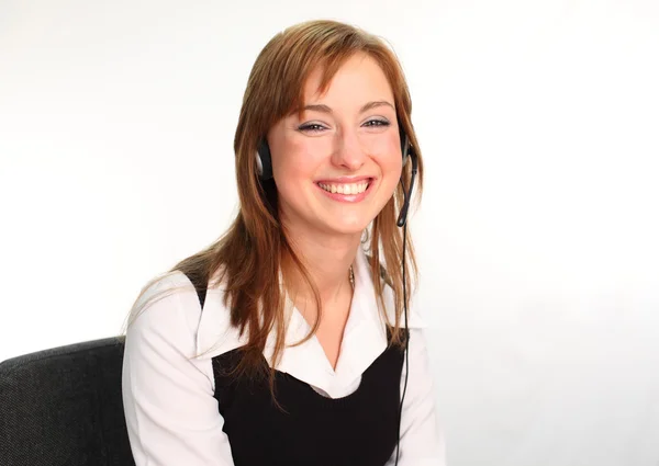 Kobieta na zestaw słuchawkowy mówić — Zdjęcie stockowe
