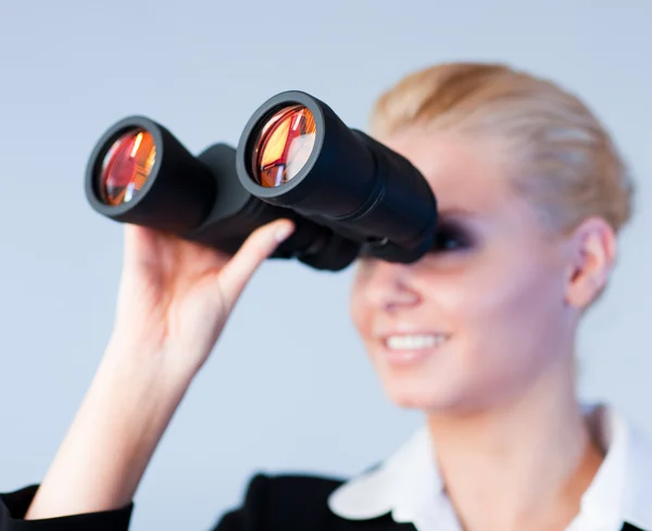 Busines woman looking through Binoculars — Stock Photo, Image