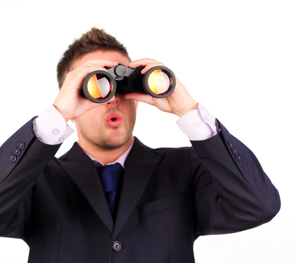 Hombre mirando a través de prismáticos sorpresa — Foto de Stock