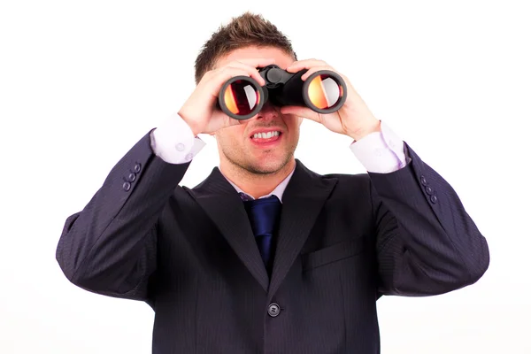 Man looking through binoculars — Stock Photo, Image