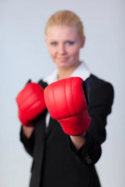 Mujer de negocios feliz con guantes de boxeo —  Fotos de Stock