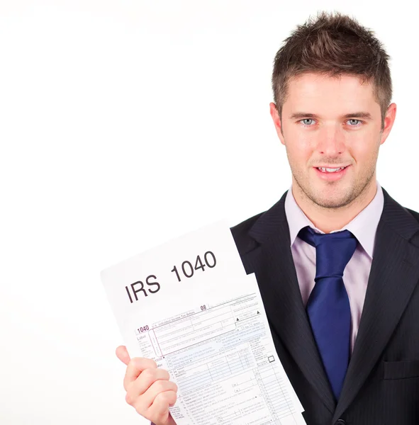 Muž napřáhl svůj finanční úřad vrátí formulář — Stock fotografie